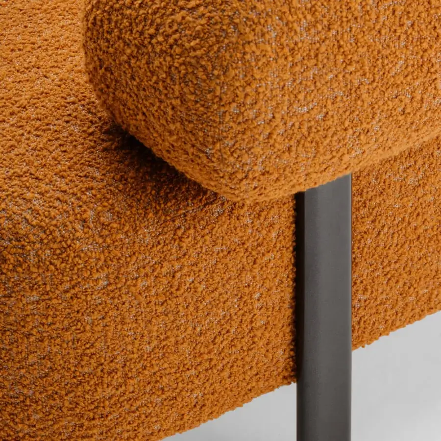 Lavish Turri Roma sofa with textured orange textile upholstery and single matte metal leg support