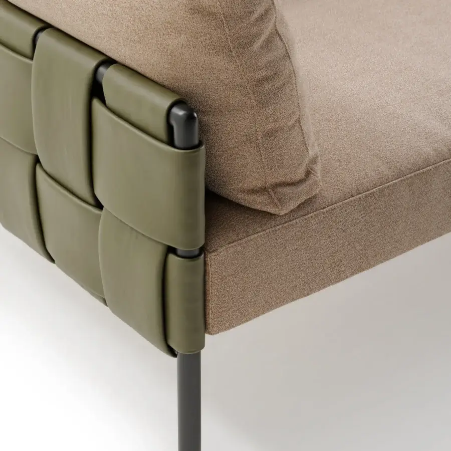 Superior Turri Ratio sofa with light brown textile upholstery and woven olive green leather frame, matte finish