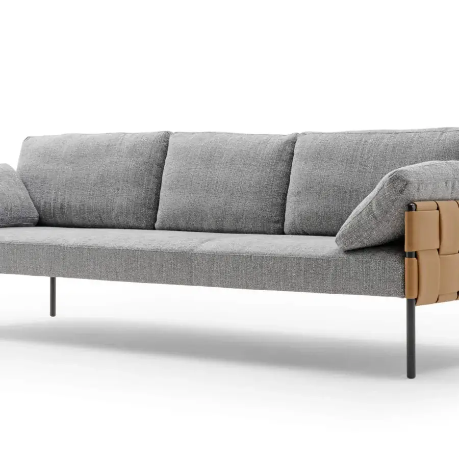 Captivating Turri Ratio sofa with a woven leather structure and gray slightly textured textile upholstery