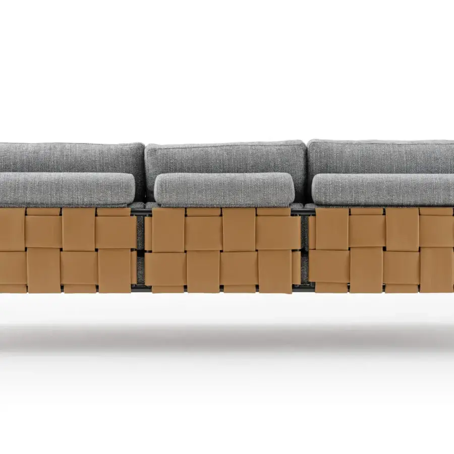 Distinguished Turri Ratio sofa with a woven light tan leather structure and generous gray textile cushions