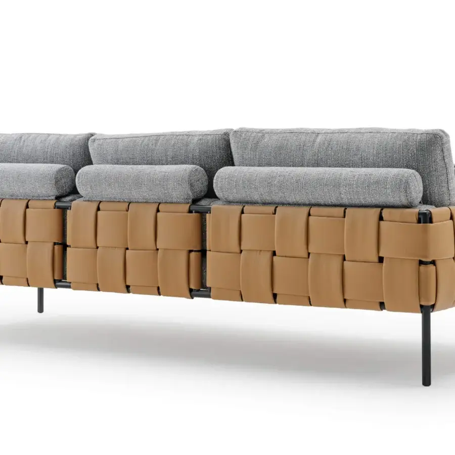 Exclusive Turri Ratio sofa with woven light tan leather and gray textile cushions exhibiting a contemporary minimalist form