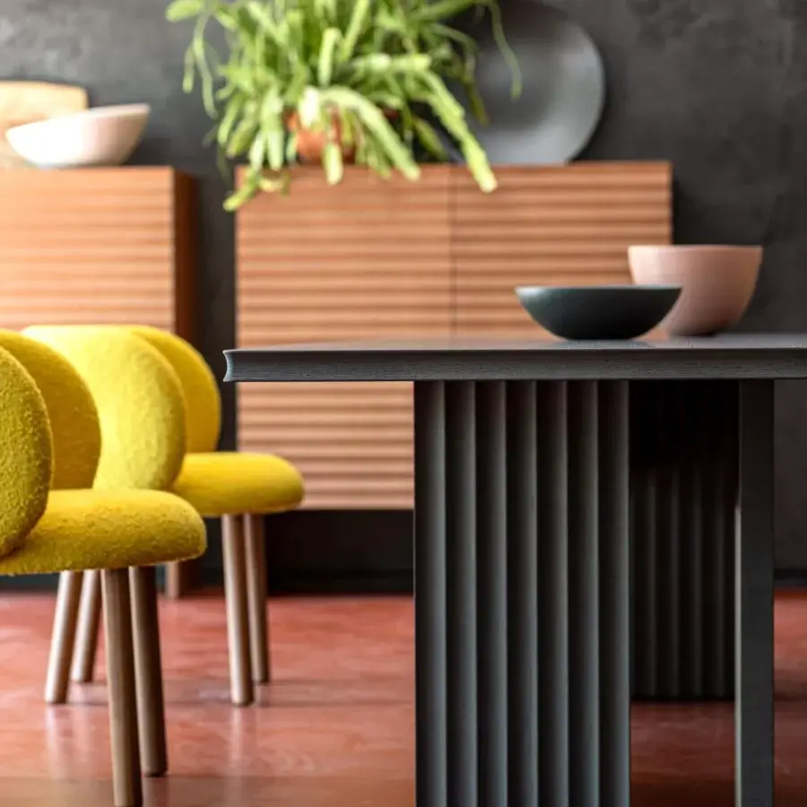 Sophisticated Moroso Rows table with fluted base crafted in matte finish dark gray veneered oak