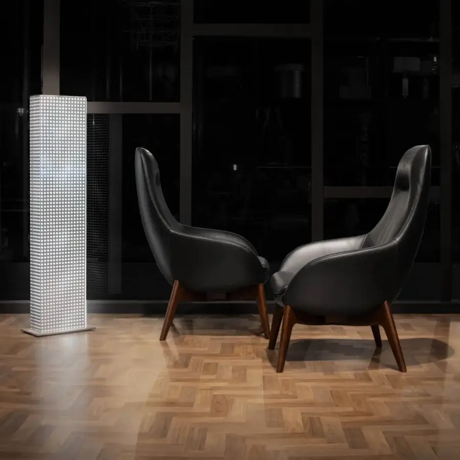 Captivating Wayne Enterprises WE-122 floor lamp with evenly spaced perforations in metallic lacquered metal construction