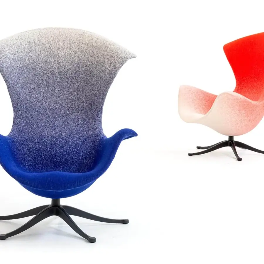 Distinguished Moroso One Page lounge chair with deep blue to white-gray textile upholstery and sleek black die-cast aluminum base