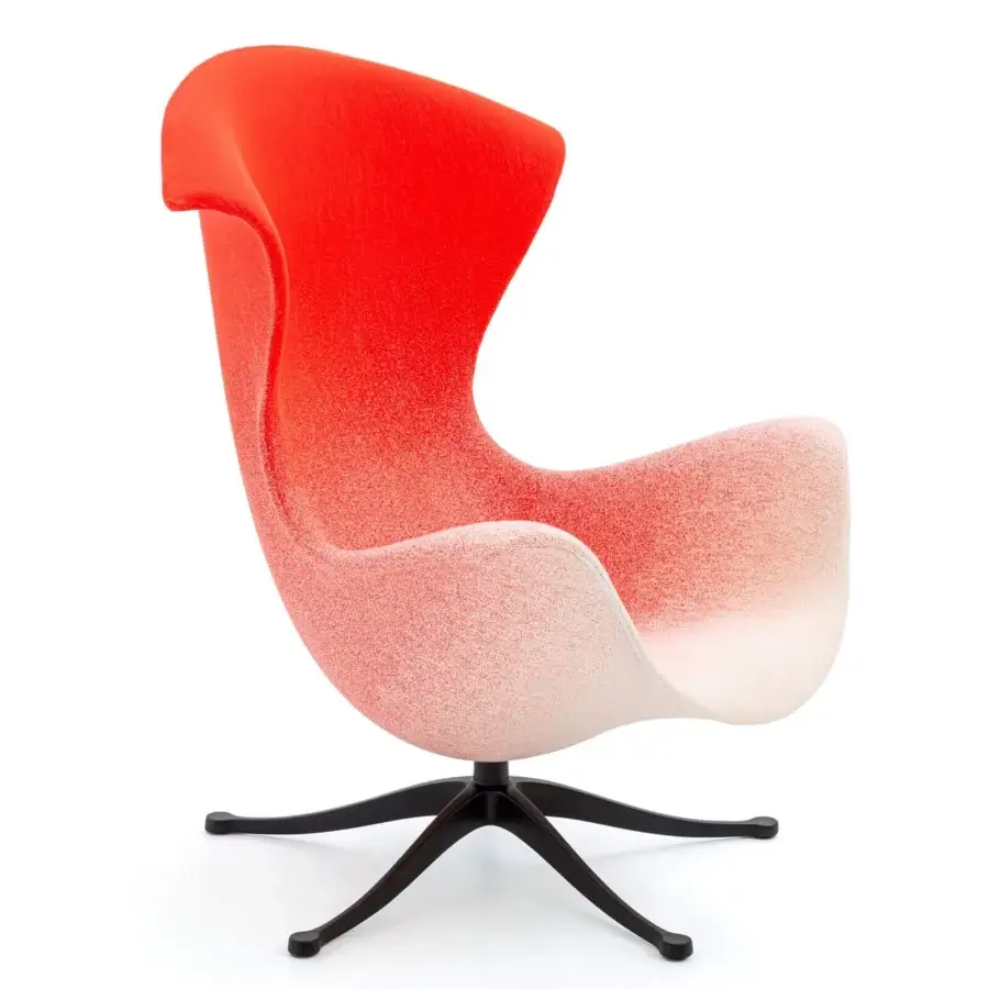 Innovative Moroso One Page lounge chair with red to off-white gradient textile and die-cast aluminum swivel base