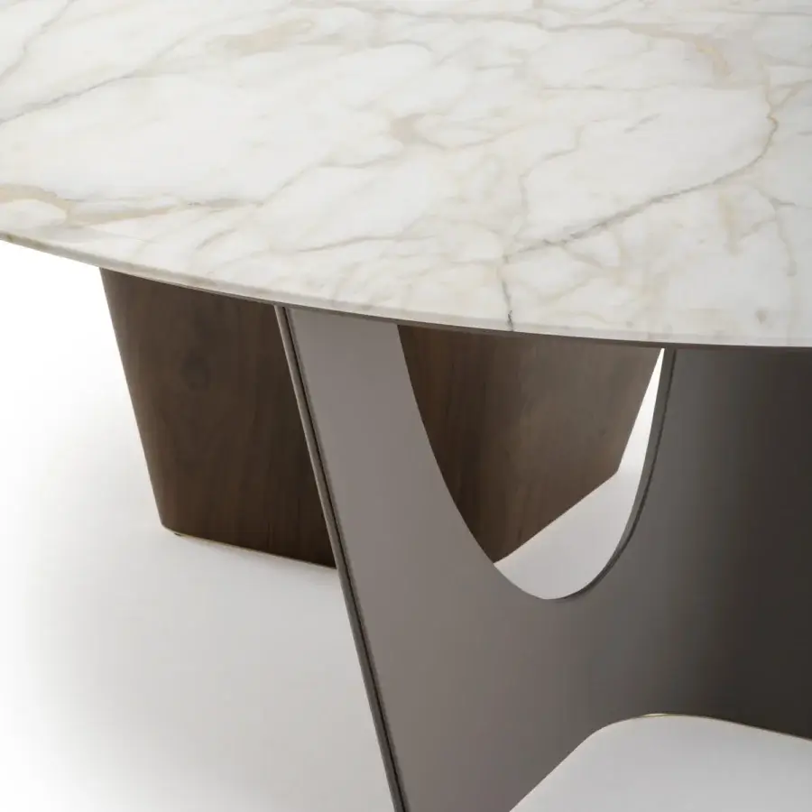 Superior Turri Pinnacle table with a round marble top showcasing white and beige tones plus a dark-stained walnut sculptural base with glossy support