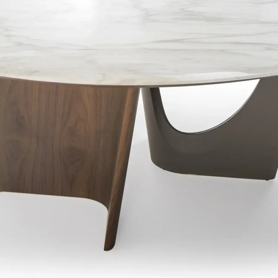Distinguished Turri Pinnacle table with round marble top and sculptural walnut wood base crafted in dark brown Italian leather
