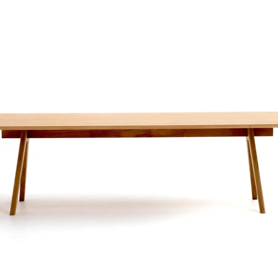 Architectural Moroso Mathilda table crafted in Italy with light natural oak veneer and solid oak base finish