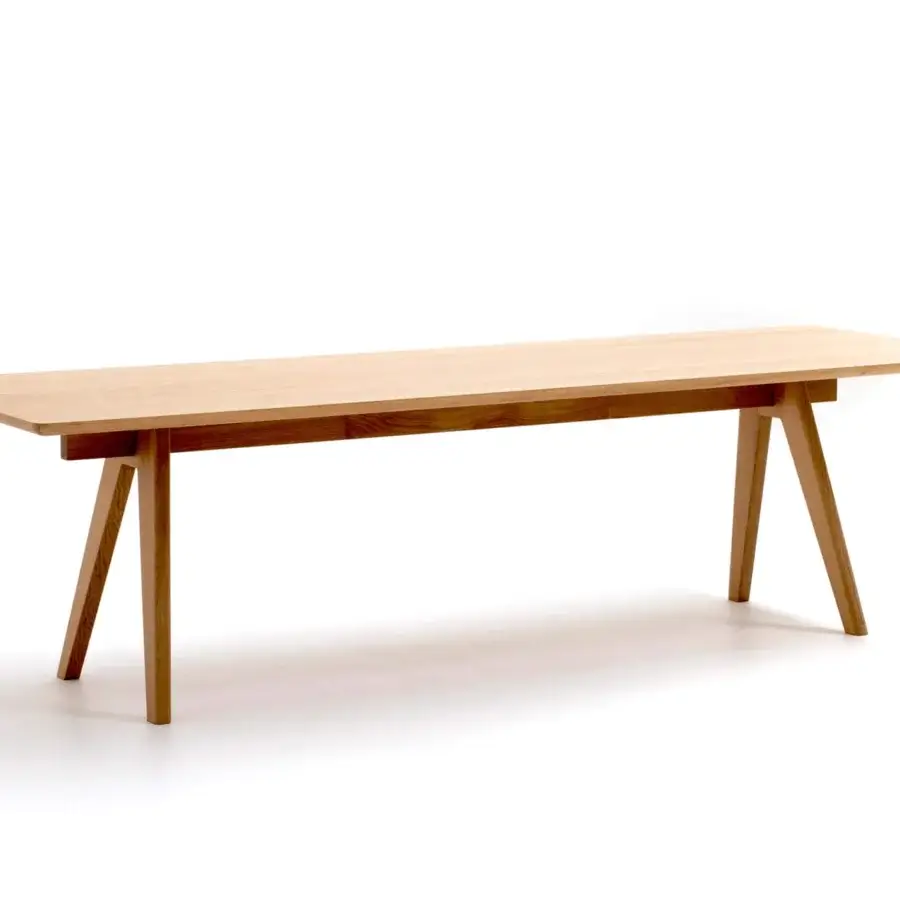 Elegant Moroso Mathilda table in light natural ash wood veneer with angled solid oak legs and smooth matte finish