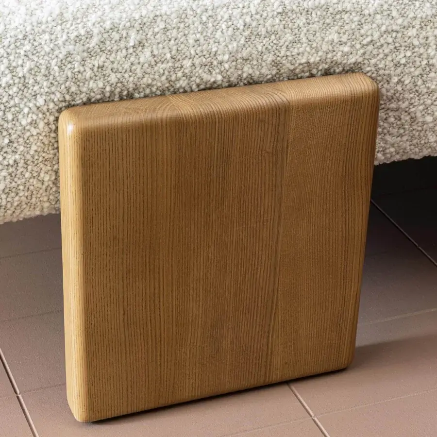 Distinguished Moroso loveseat lounge chair with light brown ash wood varnished feet and a distinct grain pattern