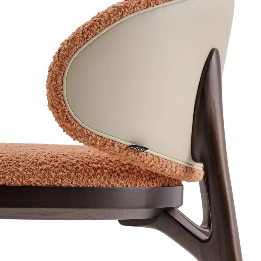 Exceptional Turri Pinnacle chair with looped orange-brown textile, light beige back and dark-stained wooden legs