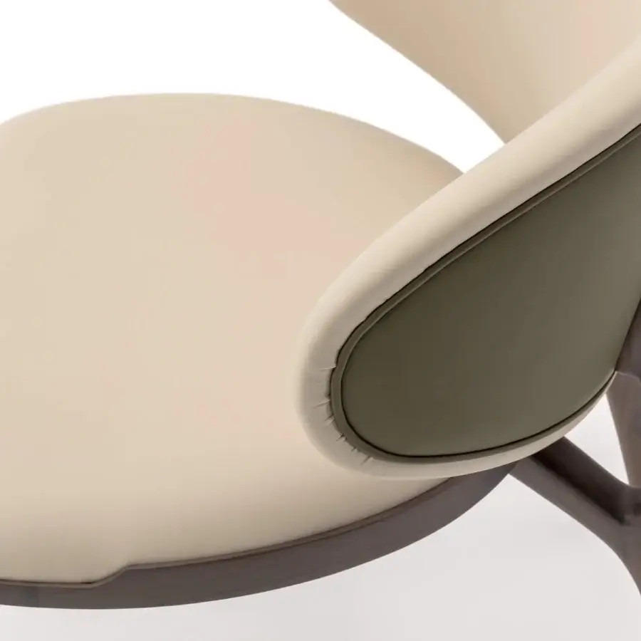 Exceptional Turri Pinnacle chair with beige leather upholstery and dark wood structure offering a contemporary aesthetic
