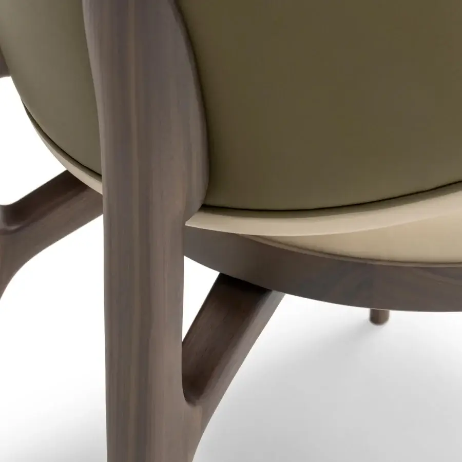 Superior Turri Pinnacle chair with muted green upholstery and matte finish beige wooden structure