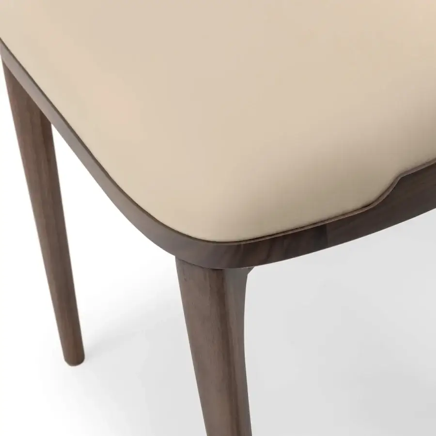 Elegant Turri Pinnacle chair with dark brown wooden structure and light smooth upholstery crafted in Italy