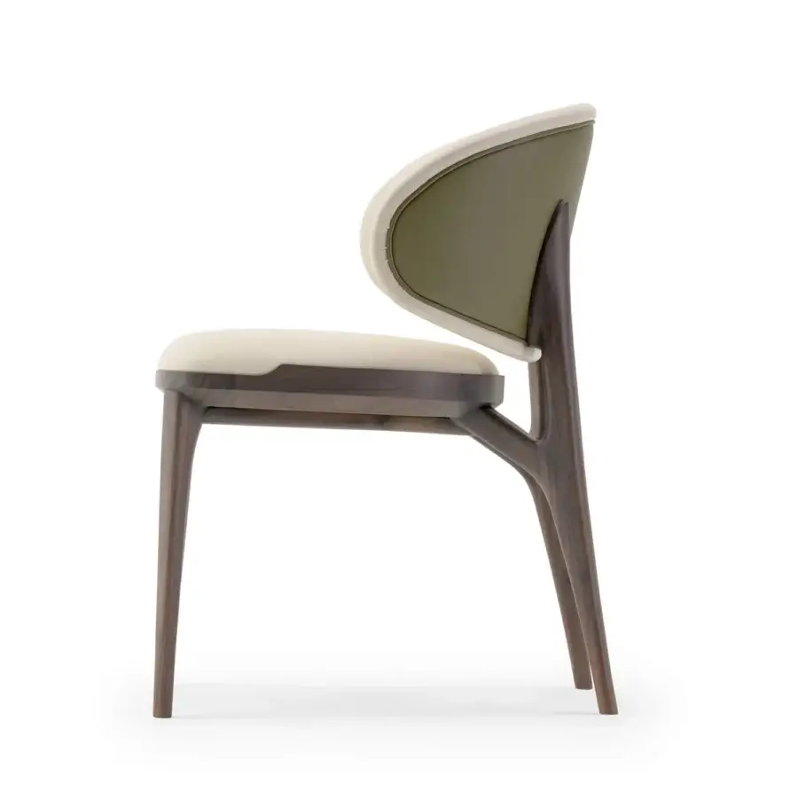 Superior Turri Pinnacle chair built with dark wood and cream textile upholstery, showcasing a balanced curved silhouette