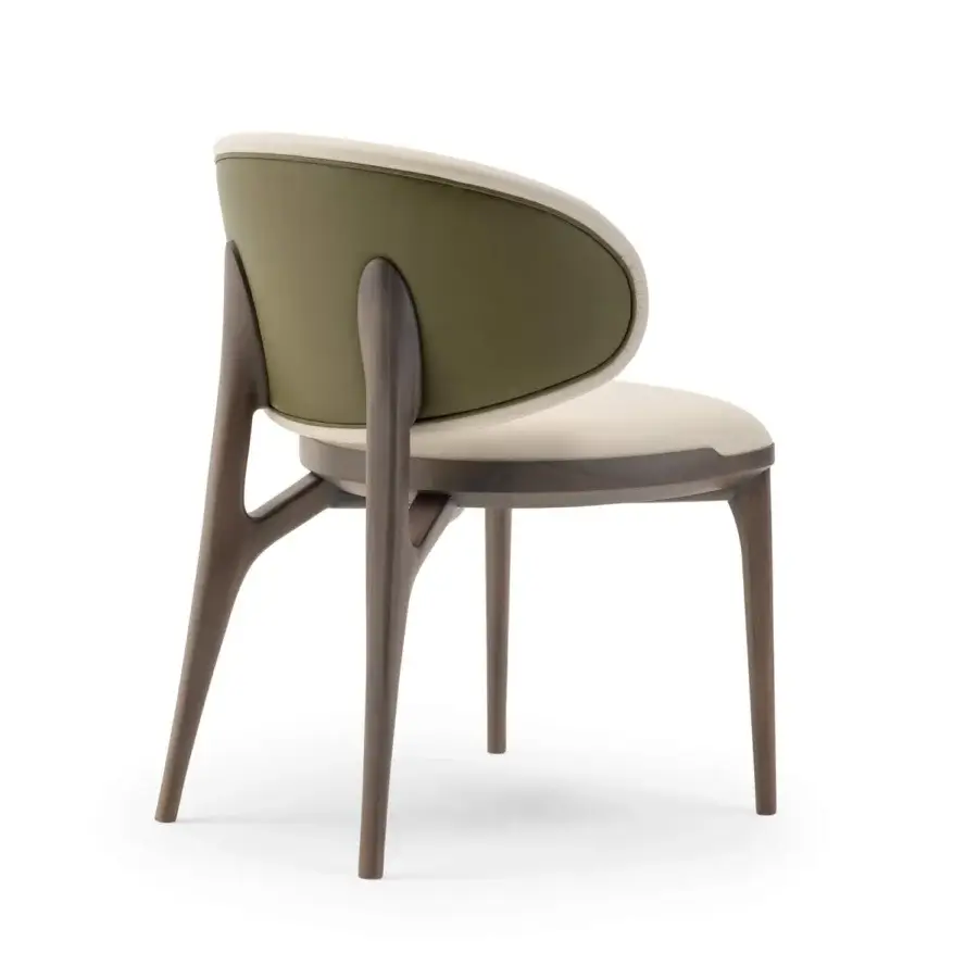 Elegant Turri Pinnacle chair with light cream textile and olive-green accents built with a matte brown wooden frame