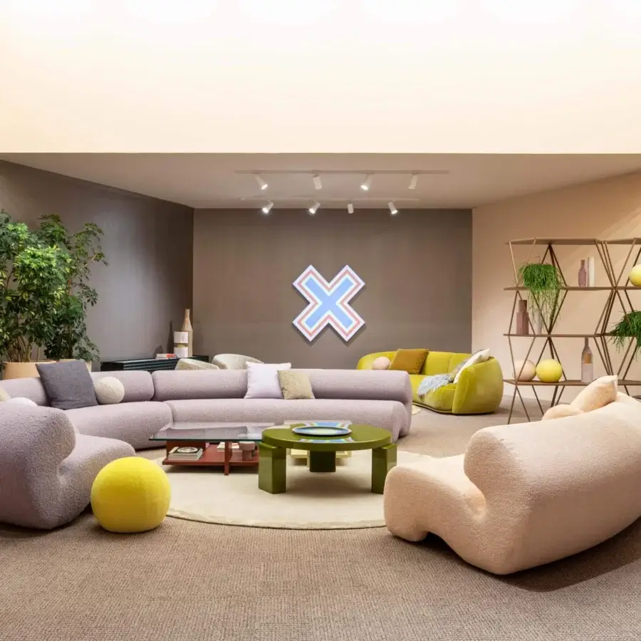 Exclusive Moroso Gruuve sofa with fluid lines and light purplish-grey textured textile, built with a Polimex® base and flexible polyurethane padding