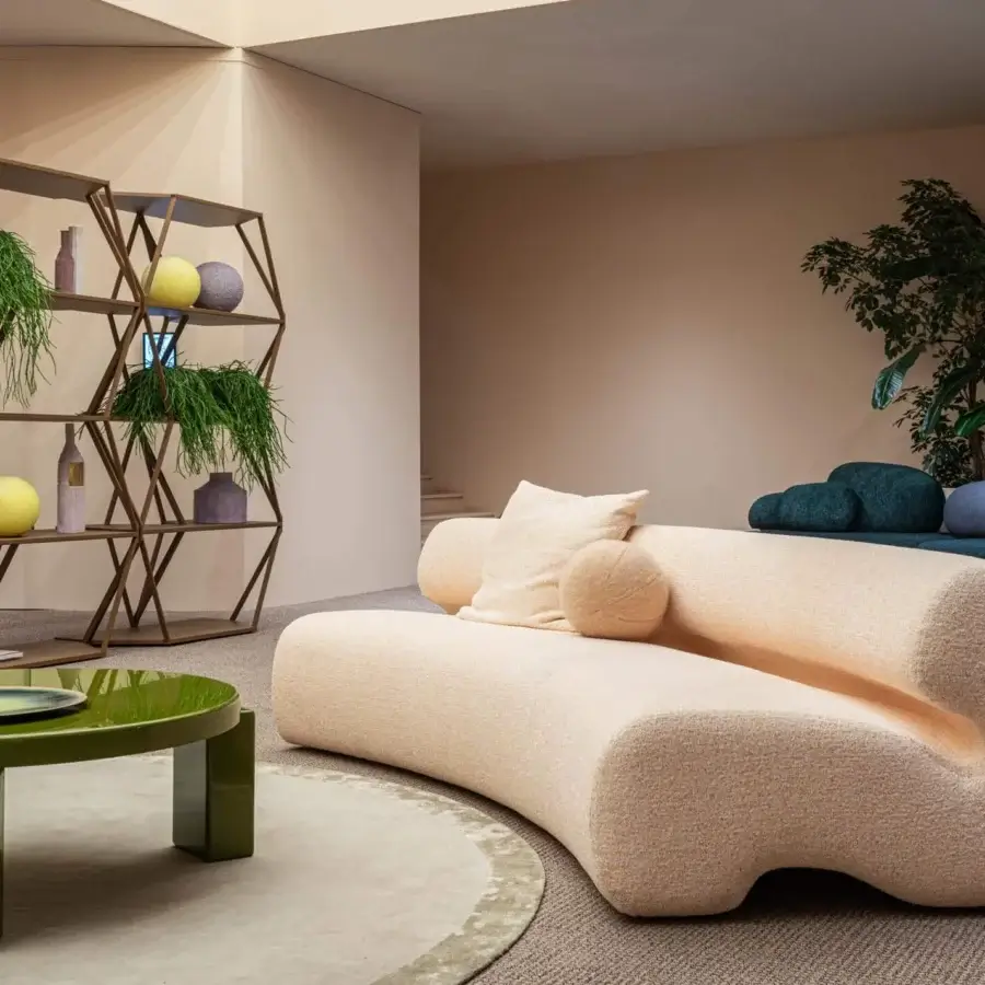 Superior Moroso Gruuve sofa with organic silhouette upholstered in textured light beige fabric and Polimex® base
