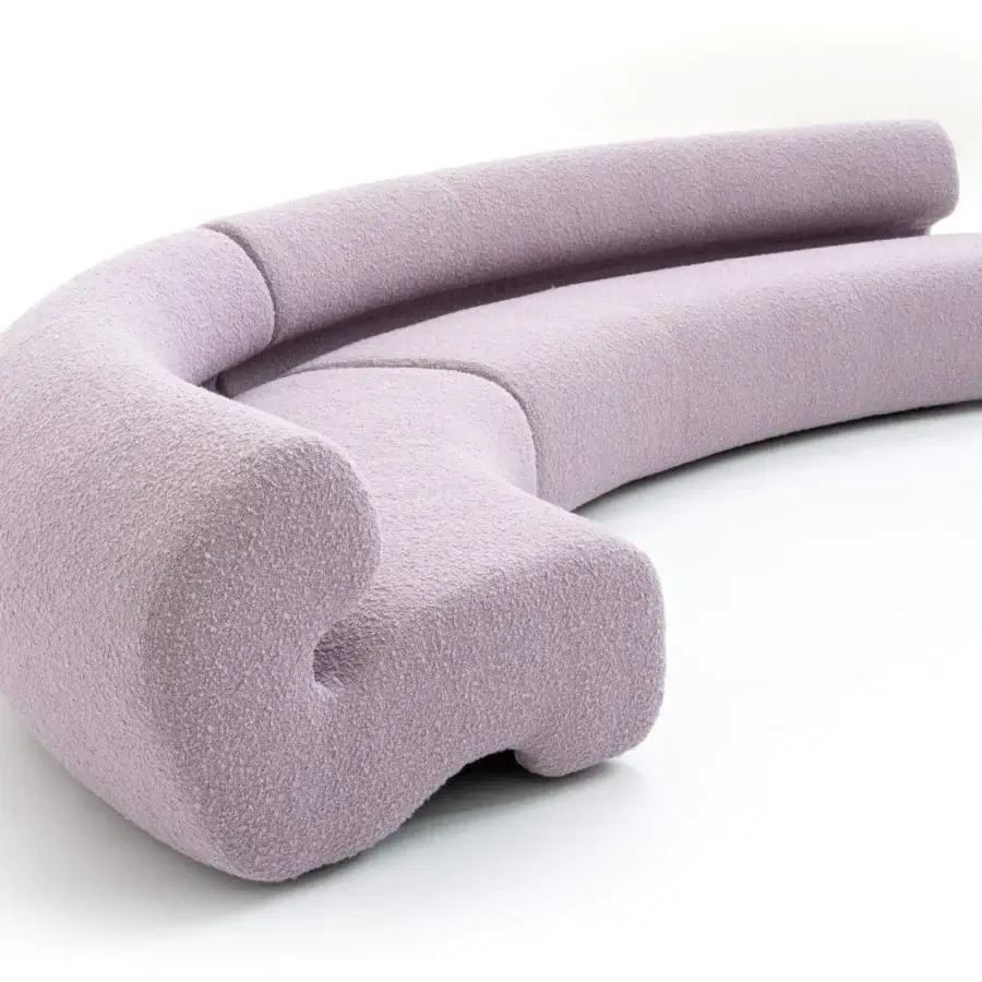 Distinctive Moroso Gruuve sofa with fluid lines upholstered in plush light lavender textile and Polimex® base crafted in Italy