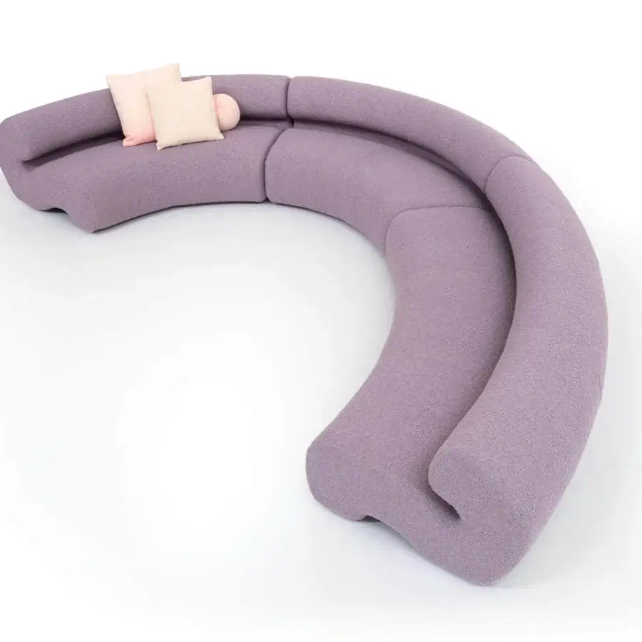 Elegant Moroso Gruuve sofa with organic lines upholstered in sumptuous matte lavender fabric and Polimex® base crafted in Italy