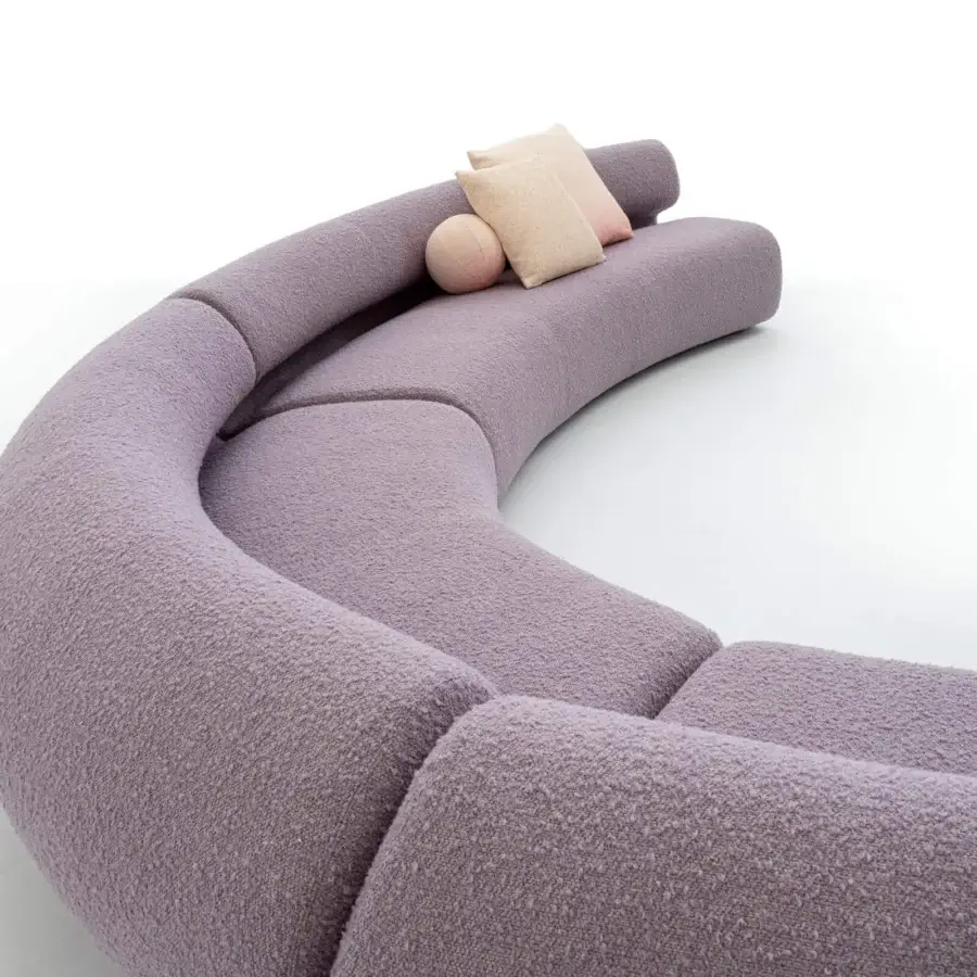 Captivating Moroso Gruuve sofa with fluid lines upholstered in lavish muted lavender textile and flexible polyurethane padding