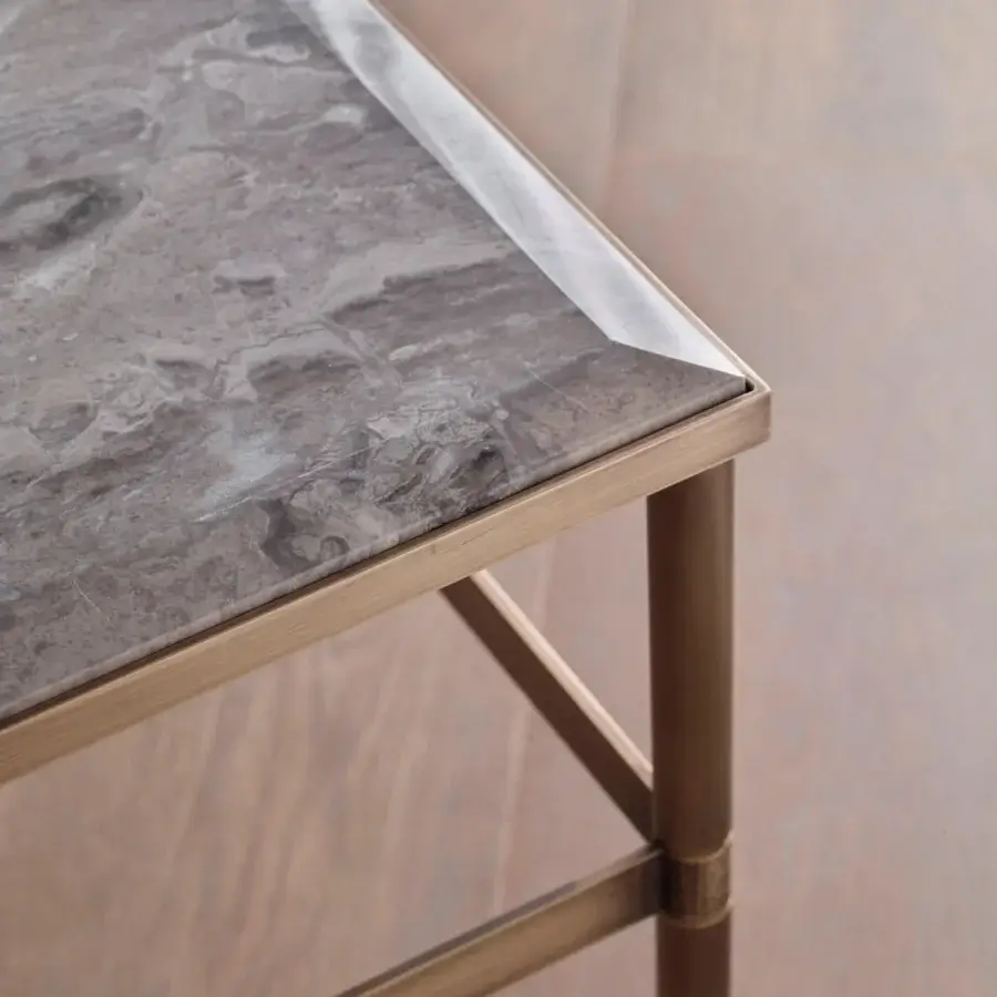 Superior Bellavista Alcobas coffee table with swirling light gray marble and sleek light gold brass frame crafted with hand-hammered details