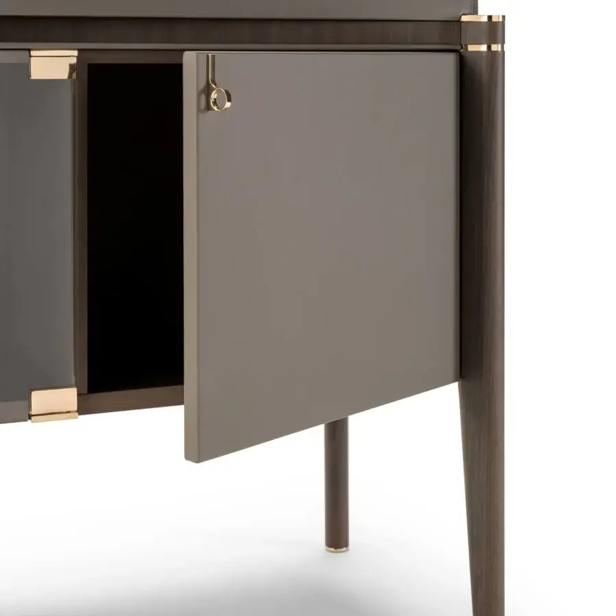Distinguished Turri Pinnacle sideboard with dark wood, refined leather applications and light gold metal details