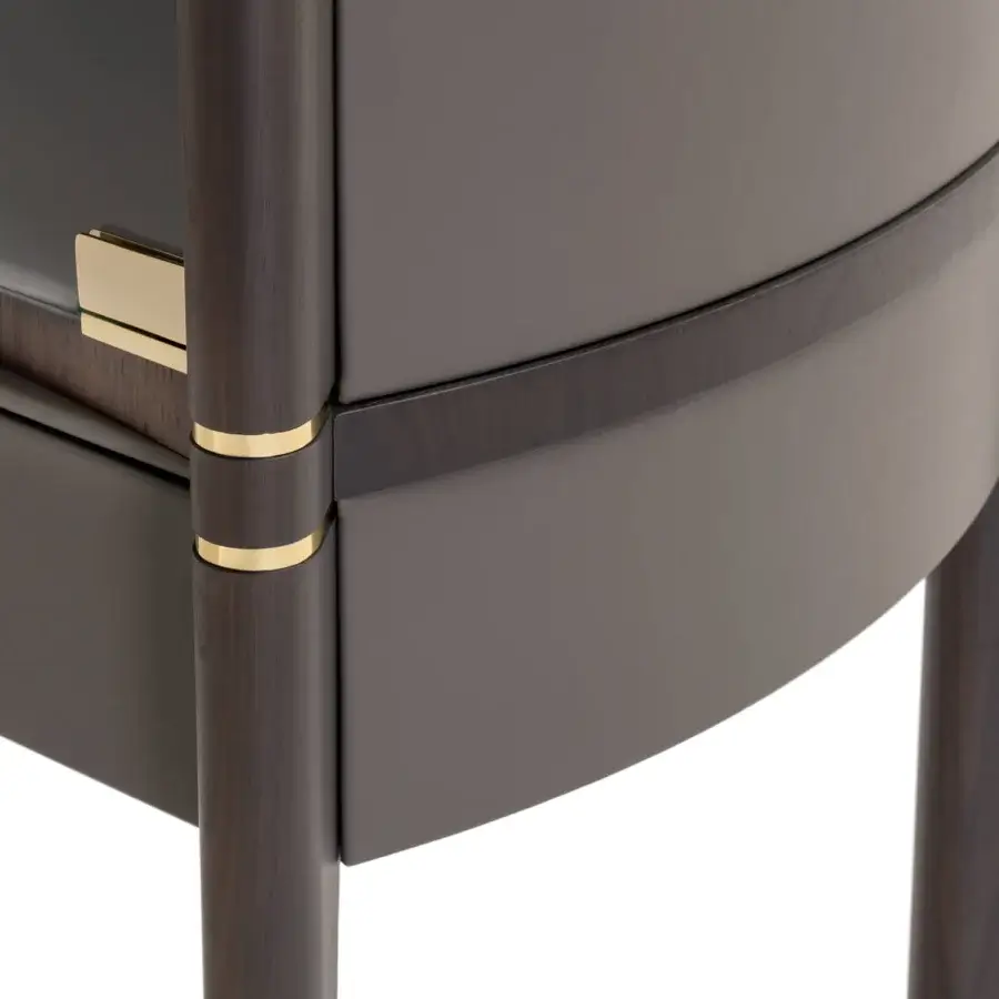 Distinguished Turri Pinnacle bar cabinet with curved features, dark wood trim and illuminated wooden shelves within glass doors