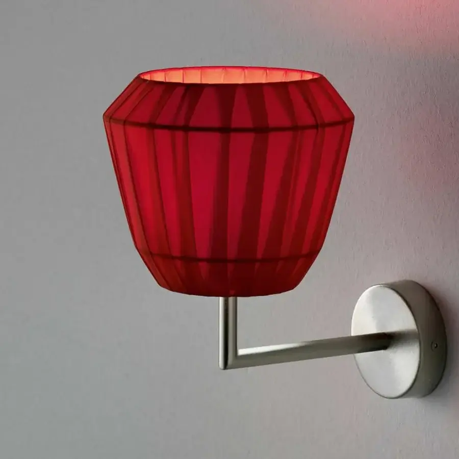 Superior Modo Luce Loto wall lamp with a red pleated textile shade and brushed metal arm and circular base