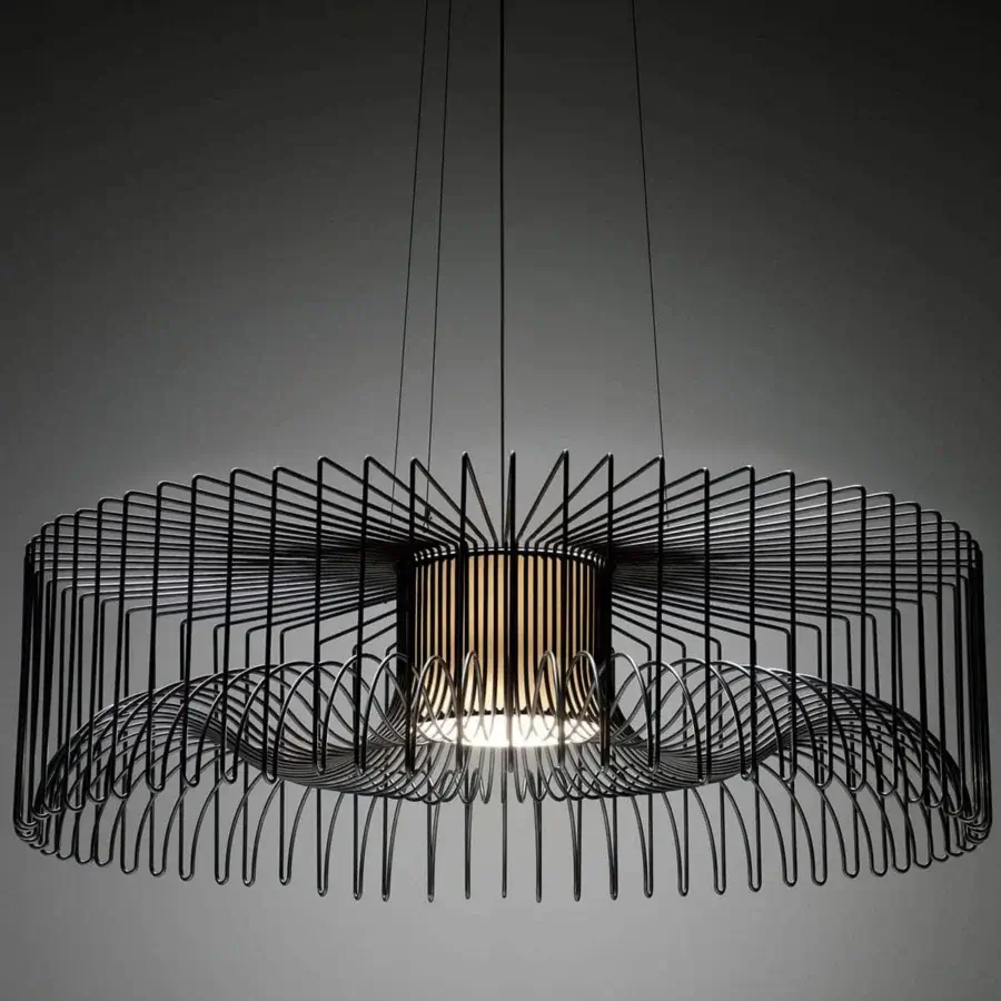 Superior Modo Luce Icaro suspension lamp with a matte black painted steel wire body and golden-toned light source