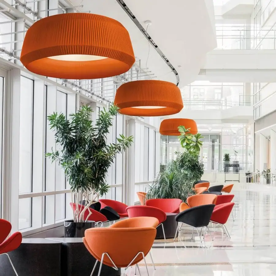 Distinguished Modo Luce Loto suspension lamp with a lightweight pleated lampshade crafted in matte orange textile-like material
