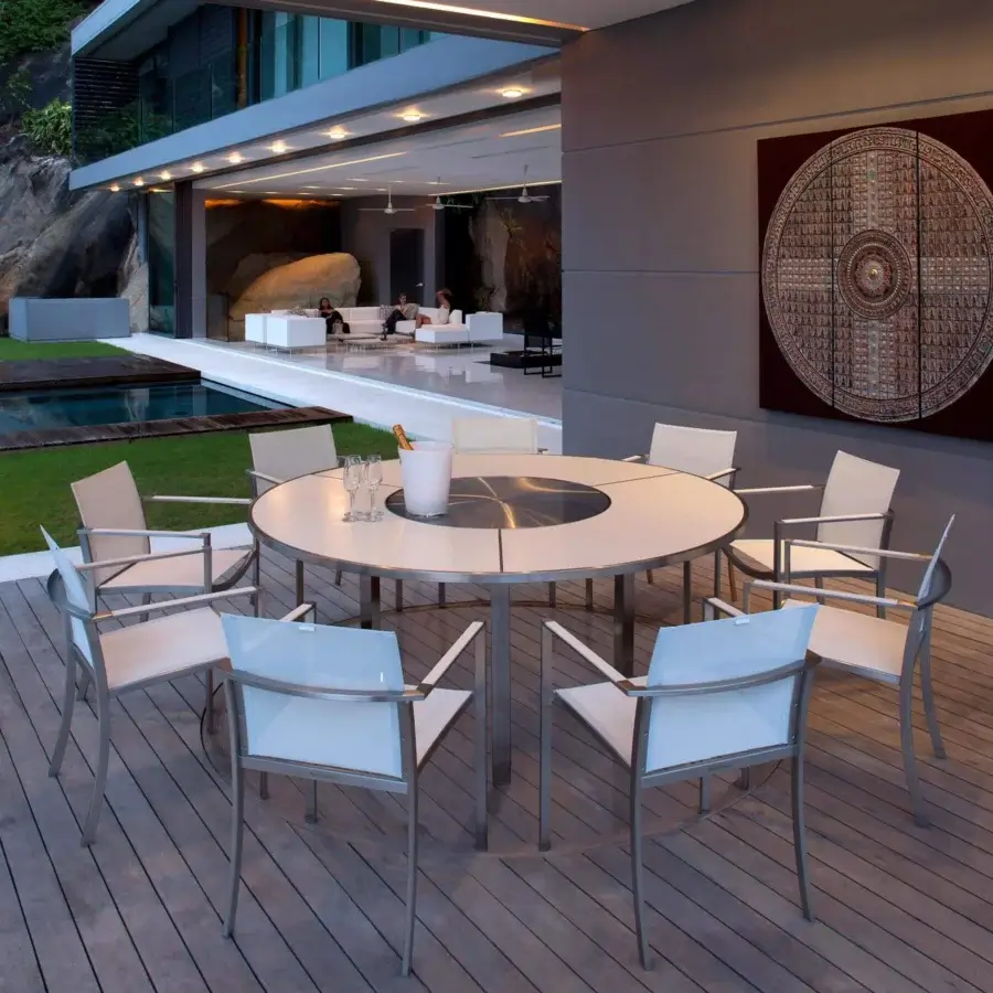 Distinguished Royal Botania O-Zon armchair with brushed stainless steel frame and crisp white Batyline seat and back