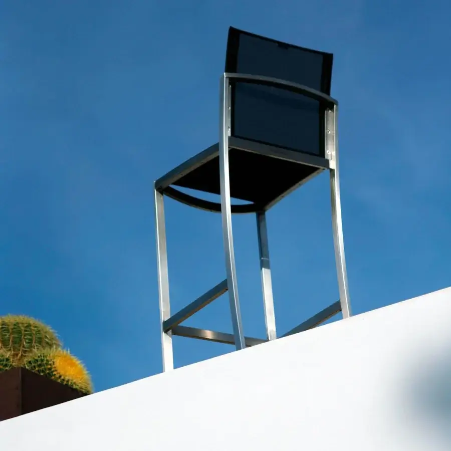 Superior Royal Botania O-Zon stool with brushed stainless steel frame and dark Batyline seat exhibiting geometric forms