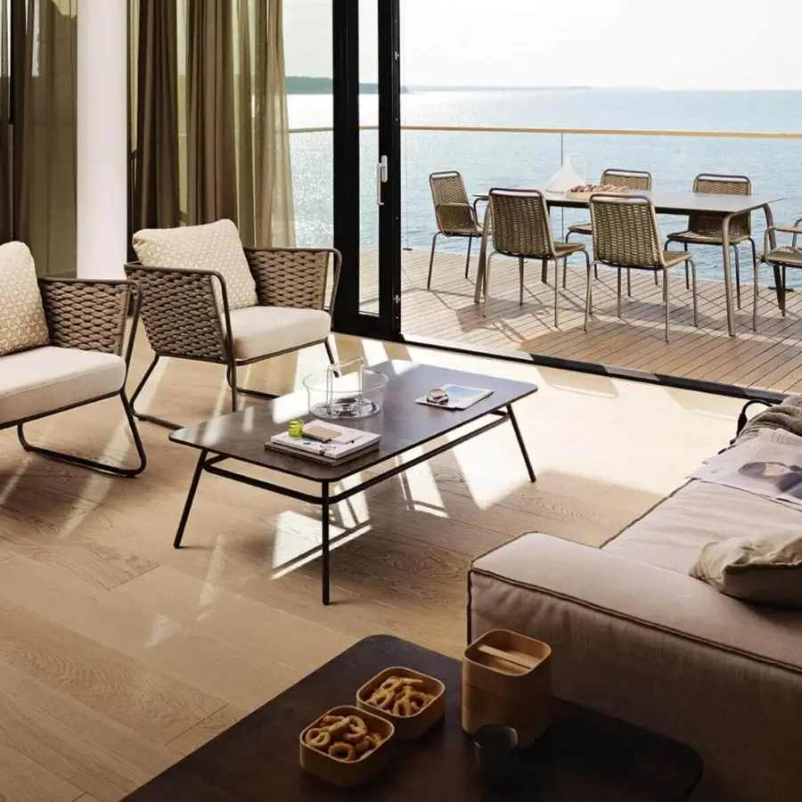 Exceptional Roberti Rattan Portofino lounge chair with a powder-coated aluminum frame woven in Nautic Rope and beige cushions