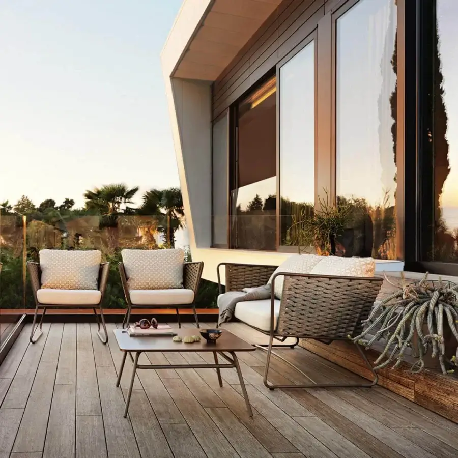 Superior Roberti Rattan Portofino lounge chair with neutral cushions and medium brown powder-coated aluminum woven with Nautic Rope
