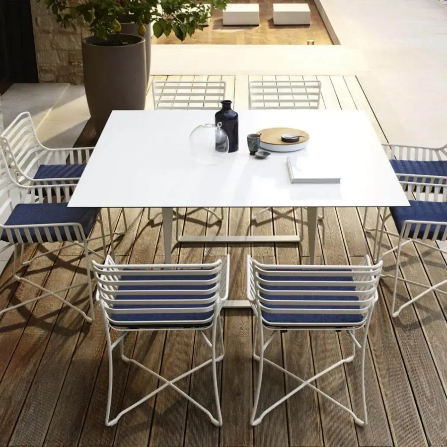 Exceptional Roberti Rattan Hamptons Graphics armchair with a matte white powder-coated aluminum structure and blue upholstery