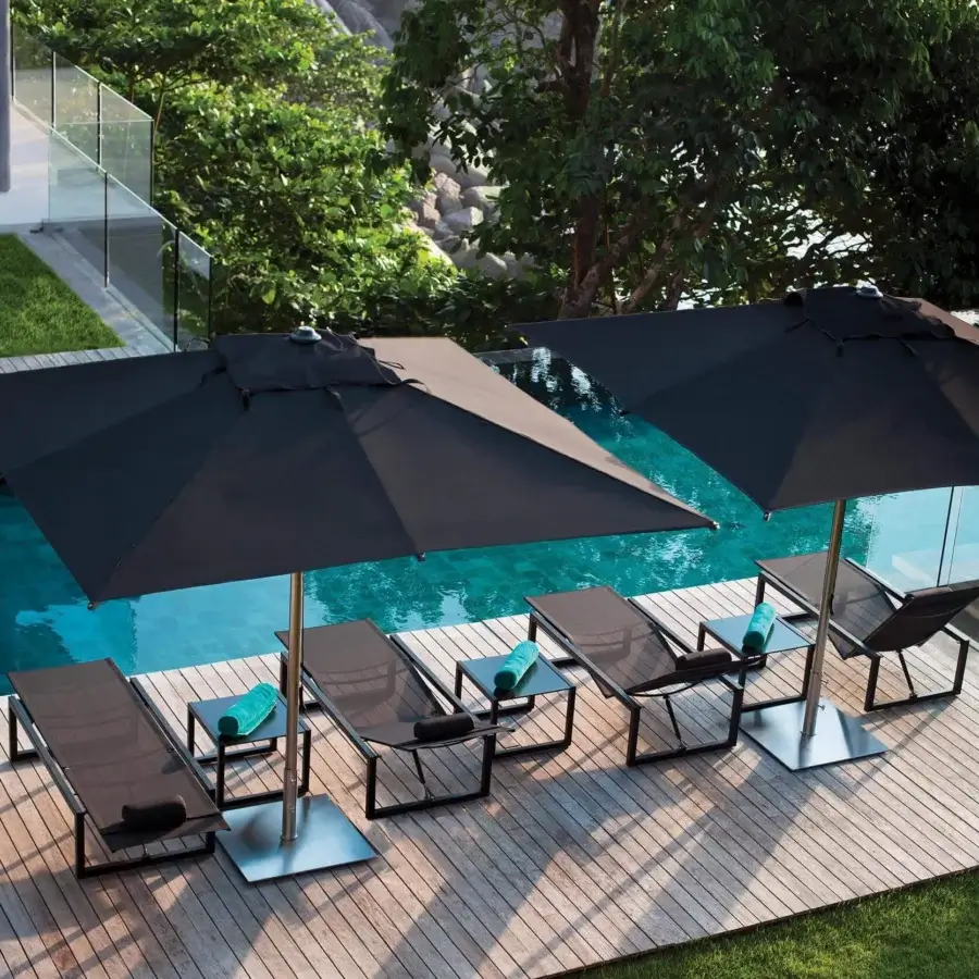 Exceptional Royal Botania Ninix lounger with black Batyline and a dark coated steel frame exhibiting a matte finish