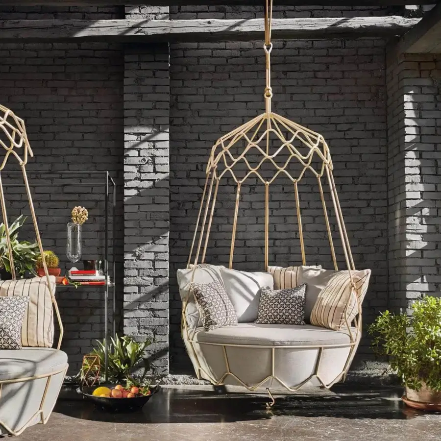 Distinguished Roberti Rattan Gravity lounge chair with stainless steel, nautical rope and light gray textile cushions
