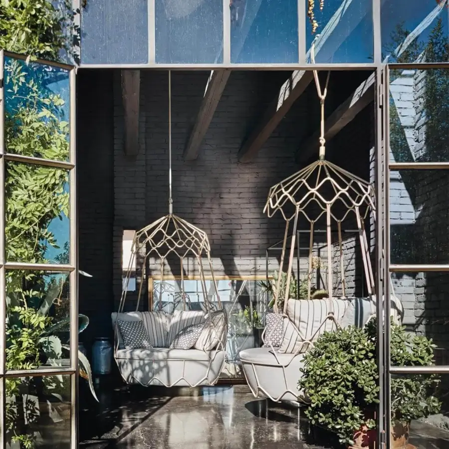 Exceptional Roberti Rattan Gravity lounge chair crafted with light gold stainless steel, nautical rope and light gray cushions with striped patterns