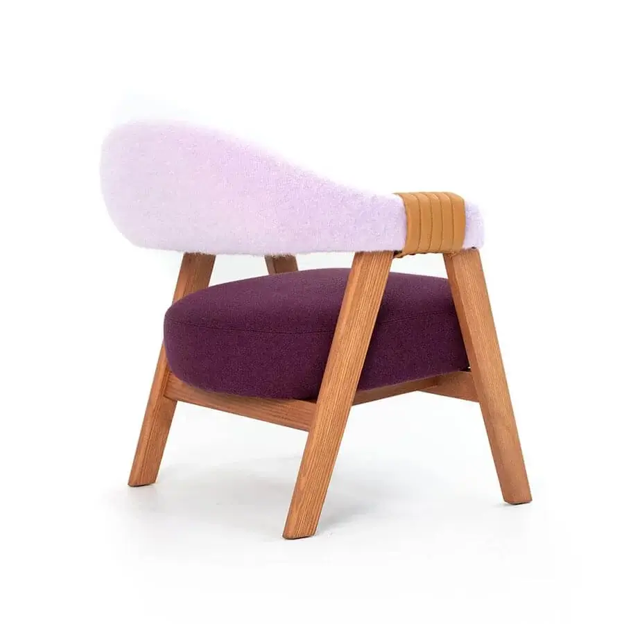 Architectural Moroso Mathilda lounge chair with lavender and purple upholstery, crafted in light brown wood