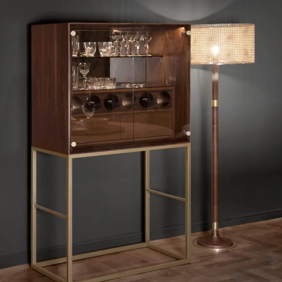 Superior Formitalia Jeffery cabinet with wood structure, metal base, mirrored interior and leather drawers in a “small trees” print