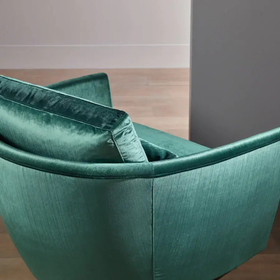 Sophisticated Bellavista Panama lounge chair with teal textile upholstery and walnut wood swivel base crafted in Italy