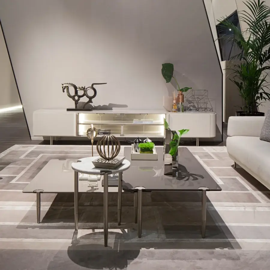 Elegant Turri Zero TV stand with lacquered wood, coated leather doors and satin metal feet in platinum finish
