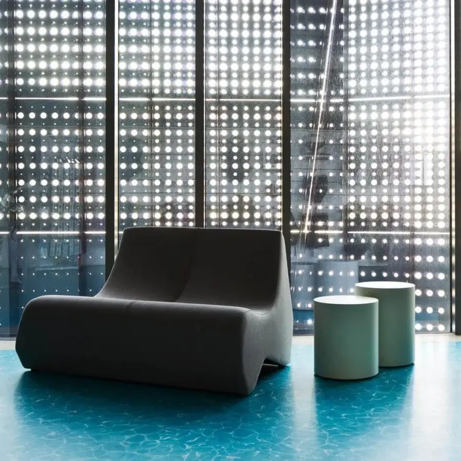Harmonious LaCividina Scancaro side table built in sheet metal with MDF and felt, presenting a smooth light green lacquered finish