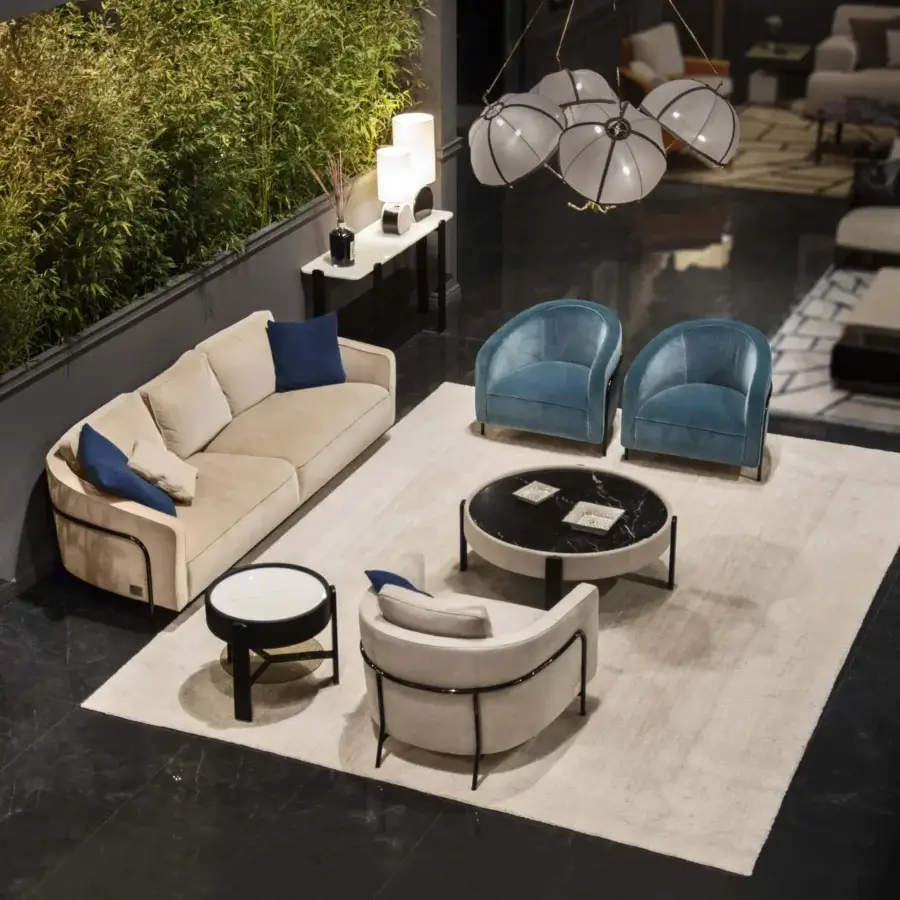 Elegant Formitalia Kean side table with white marble-like top, glossy black wood legs and metal feet crafted in Italy