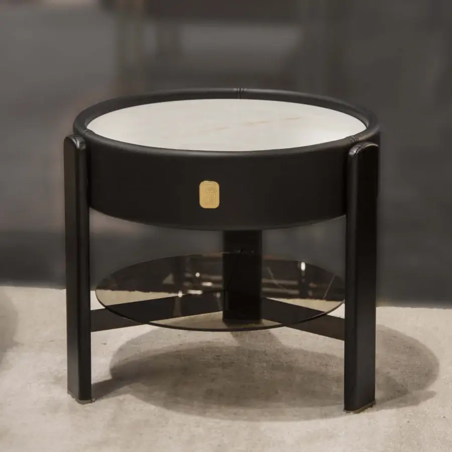 Exceptional Formitalia Kean side table with marble top encased in dark leather, built with wood legs and glass shelf