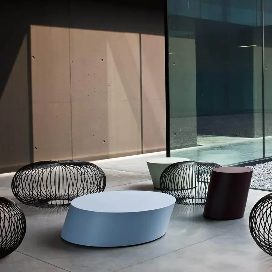 Elegant LaCividina Scancaro side table in light blue sheet metal with a smooth matte lacquered finish and MDF felt base