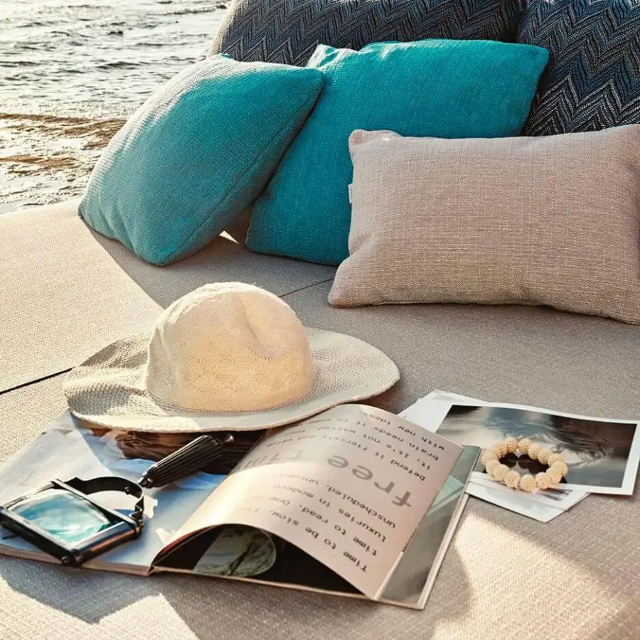 Distinguished Roberti Rattan Portofino lounger with powder-coated aluminum woven with Nautic Rope and teal, beige, patterned cushions with textured matte finish
