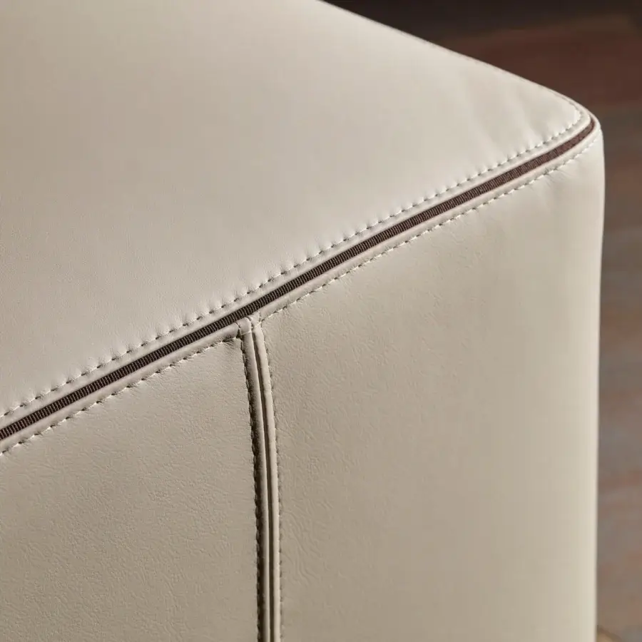 Distinguished Bellavista Frida bench with light beige synthetic leather upholstery and hand-refined cast brass base
