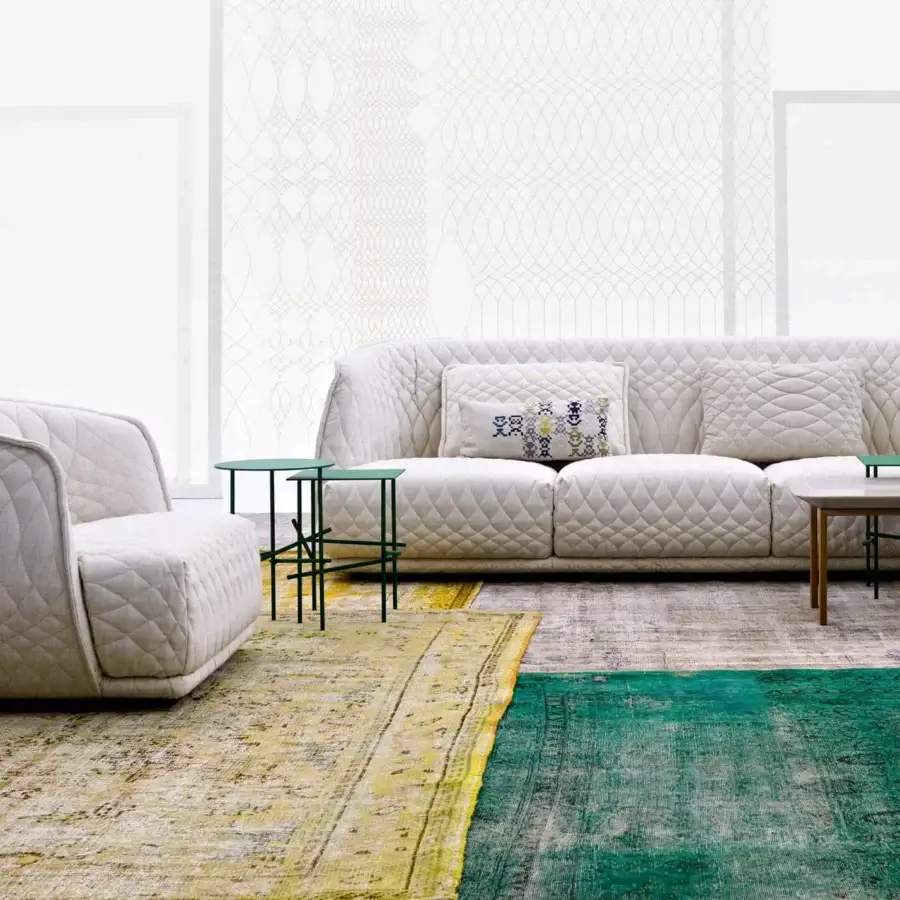 Distinctive Moroso Redondo sofa crafted in Italy with quilted off-white textile and rounded shell cushions